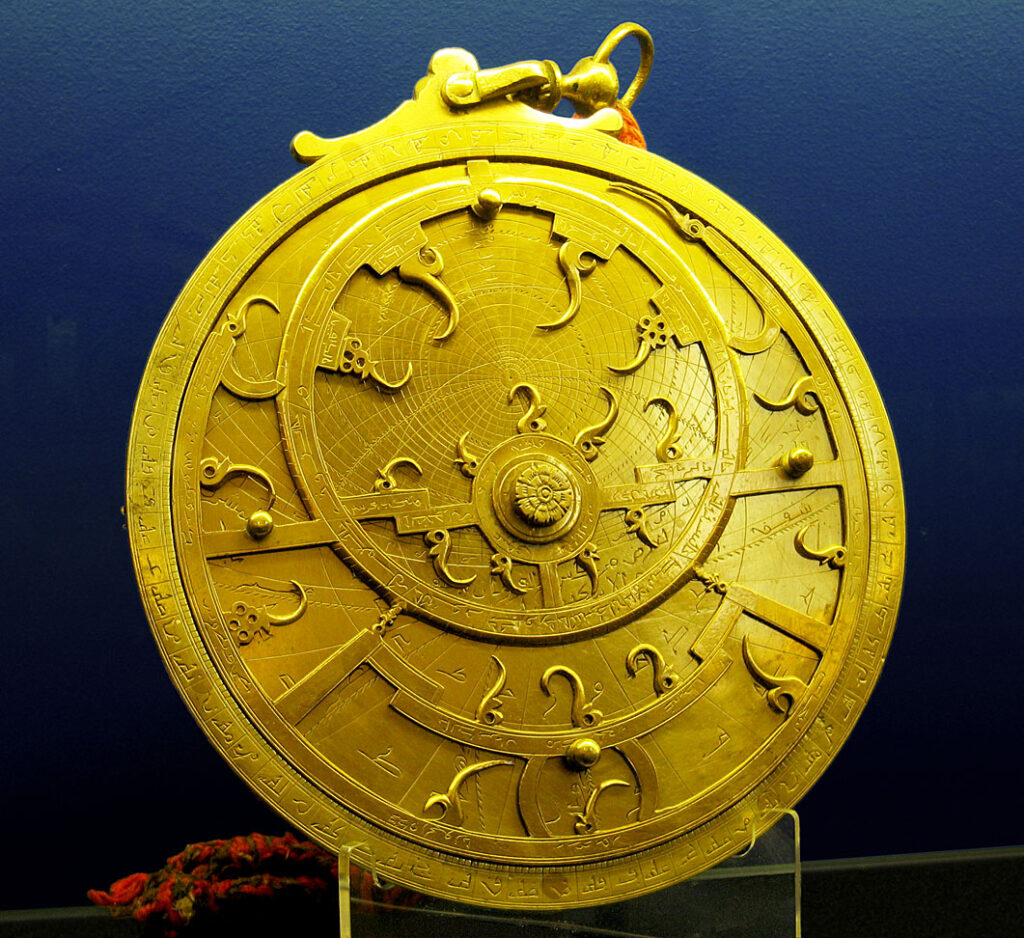 A brass Persian astrolabe with pierced, engraved plates, an image for Islam and Science: The Scientific Tradition