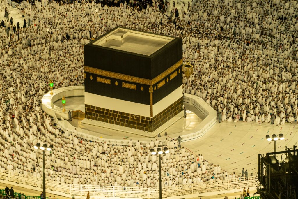 Aerial view of the Kaaba in Mecca, Saudi Arabia, with thousands of pilgrims during Hajj season, an image for The Satanic Verses Incident: What Happened and Why It Matters