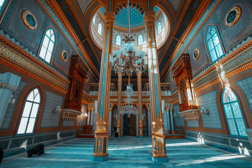 Explore the ornate interior of Yildiz Hamideye Mosque in Istanbul with intricate designs and chandeliers.