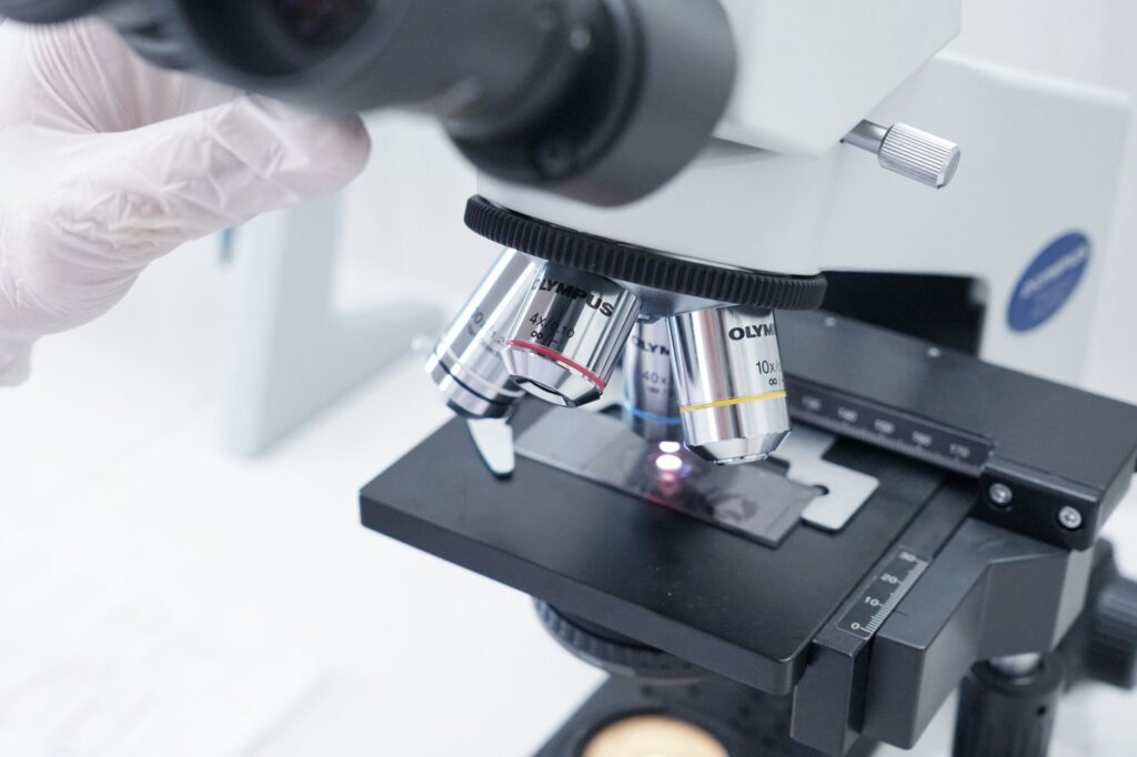 Detailed view of a microscope in a laboratory used in scientific research.