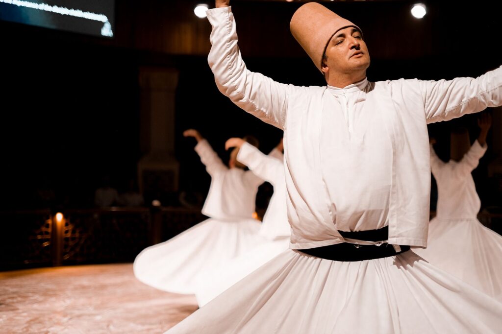 Captivating image of a Sufi dervish performing the spiritual whirling dance in traditional attire, an image for The Spiritual Heart of Islam: Beyond Rules and Ritual
