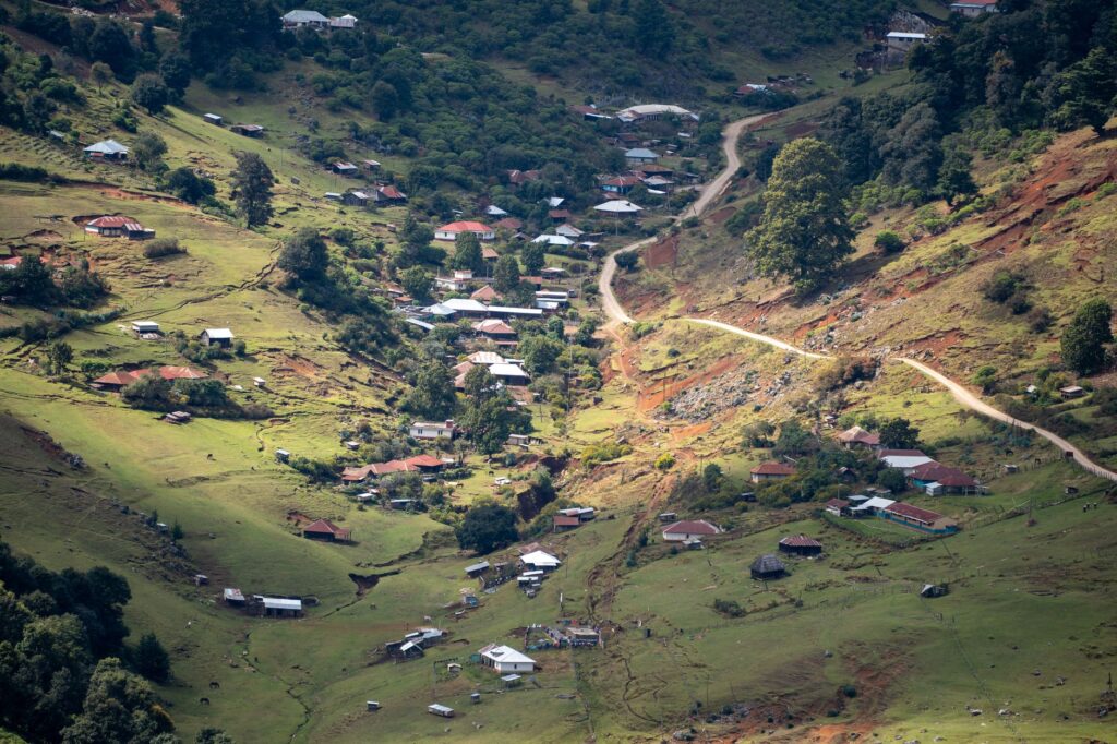 A stunning aerial view of Chiantla valley in Huehuetenango, Guatemala, showcasing rural landscapes and small communities.