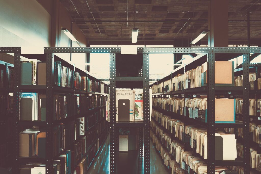 Bookshelves in a library with a vintage tone in San José, Costa Rica.