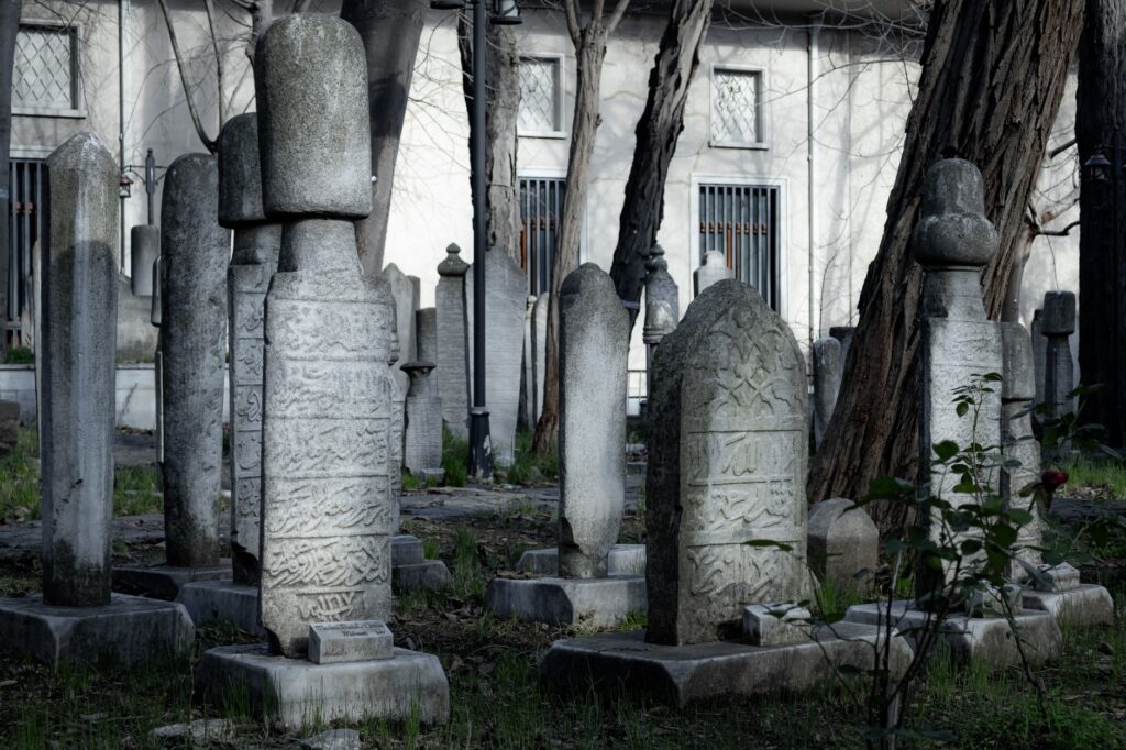 Explore an ancient Ottoman cemetery with intricate tombstones in İstanbul, Türkiye.