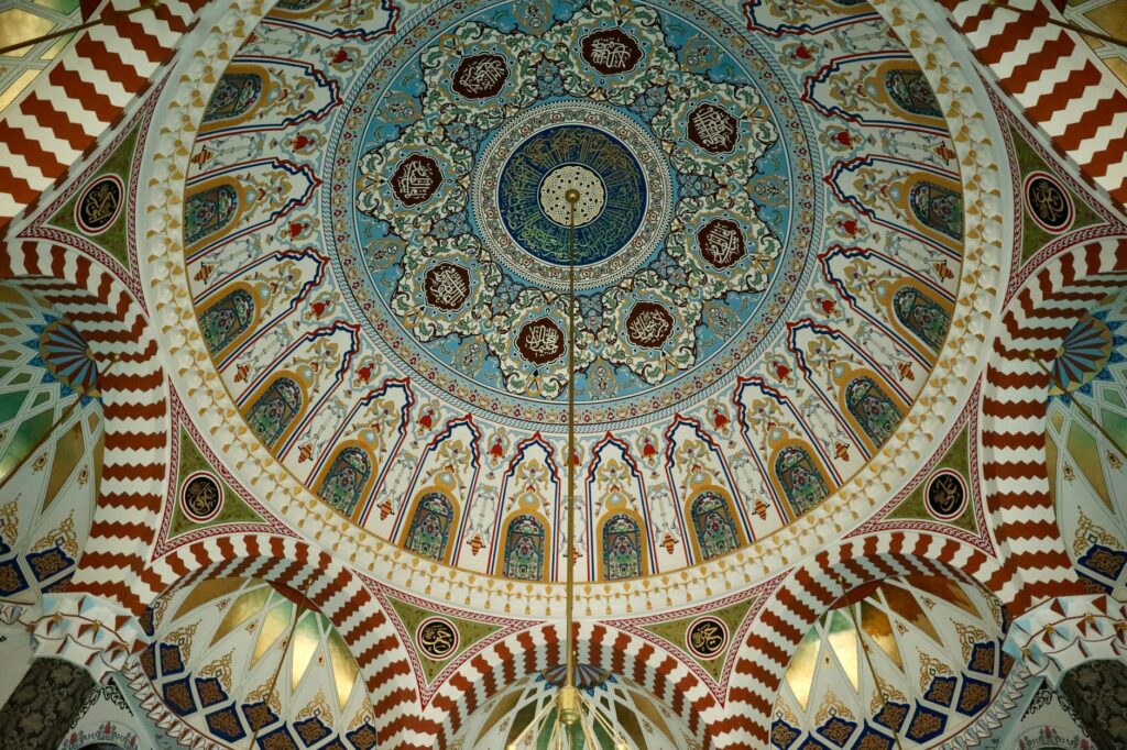 Intricate dome design in an Isparta mosque showcasing Islamic art and architecture.